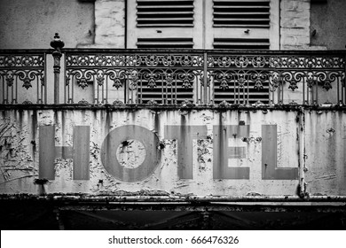 Sign Of A Broken And Abandoned Hotel, Detail Of An Old Information, Crisis And Ruin