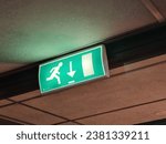 Sign in a building showing the emergency exit from the first floor (or higher)