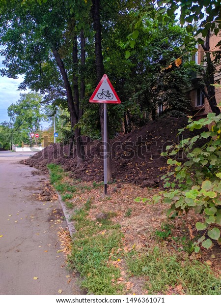 Sign for cyclist near the\
road