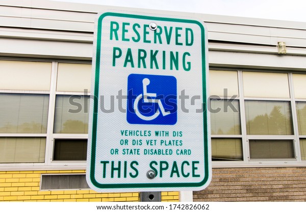 Sign
depicting only disabled people can park in the
spot