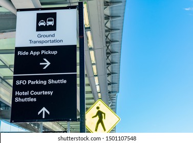 Sign Directing San Francisco International Airport Passengers To Ground Transportation, Rideshare App Pickup, Parking Shuttle And Hotel Courtesy Shuttles - San Francisco, CA, USA - Circa, 2019 