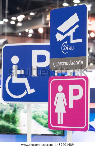 Sign of disabled\
parking - Signs symbols parking for women - 24 hours cctv/video\
surveillance warning sign