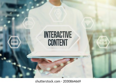 Sign displaying Interactive Content. Word for It requires the participants active engagement Lady In Uniform Holding Tablet In Hand Virtually Typing Futuristic Tech. - Shutterstock ID 2030864669