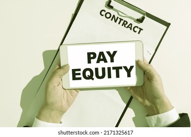 Sign Displaying Pay Equity. Concept Meaning Eliminating Sex And Race Discrimination In Wage Systems 