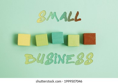 Sign displaying Small Business. Business concept an individualowned business known for its limited size Stack of Sample Cube Rectangular Boxes On Surface Polished With Multi-Colour