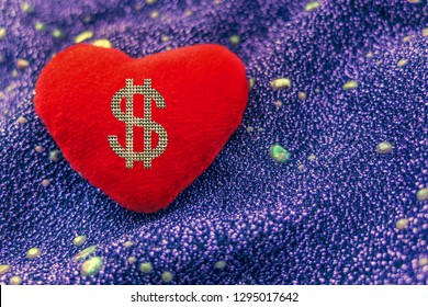 Sign Dollar On Red Heart On Neon Backgrond. Love Or Money.