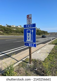 Sign for electric vehicle fast charging station along the Coast Highway in Southern California.