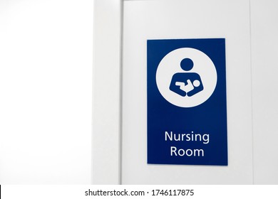 A Sign At The Entrance To The Baby Nursing Room. Feeding And Swaddling Children In A Public Place