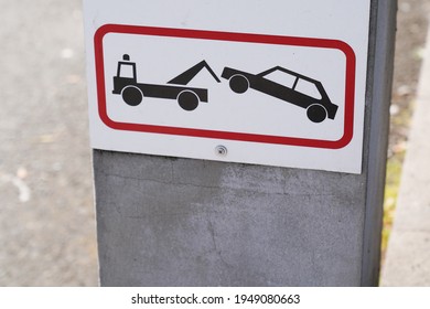 Sign evacuation of car to impound No parking any time Punishment symbol