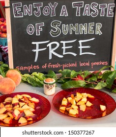 Sign At Farm Market For Fresh Peaches Along With Sign For Free Samples.