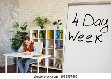 Sign Four Day Week For Work In The Office On The Whiteboard.
