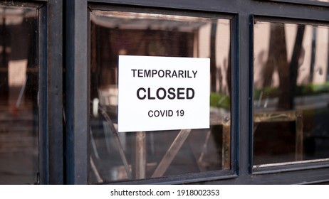 The Sign In Front Of The Office Is Temporarily Closed. Sign Coronavirus In The Store