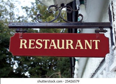 Sign Hanged Outside A Restaurant