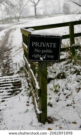 A sign to indicate that this is private land, in the British countryside