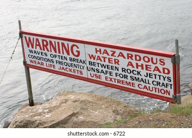 sign indicating dangerous water conditions