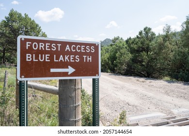 Sign Leading Drivers To The Blue Lakes Trailhead In Colorado