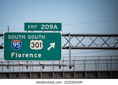 A Sign Leads Travelers Towards Florence, SC, Via US Interstate 95.