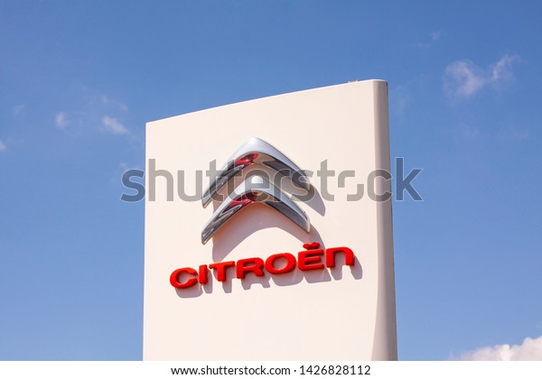 Sign with the logo of Citroën. French automobile\
manufacturer, part of the PSA Peugeot Citroën group. Copenhagen,\
Denmark - June 17, 2019