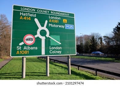 Sign for London Colney Roundabout with directions for Hatfield, London, St. Albans and London Colney