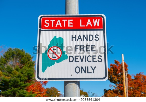 Sign of\
Maine State Law shows Hands Free Devices Only when driving vehicles\
in town of Kittery, Maine ME, USA.\
