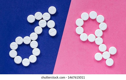 Sign Of Man And Woman From Pills On Colored Background. Concept Of Female And Male Health And Sexuality. Problems Conceiving. Infertility Treatment. Sexual Problem. Gender Sign.