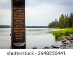 A sign marking the trail to the Mississippi Headwaters, guiding visitors to the source of this iconic river.