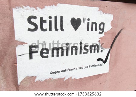 Similar – Graffiti: “Women want revolution”