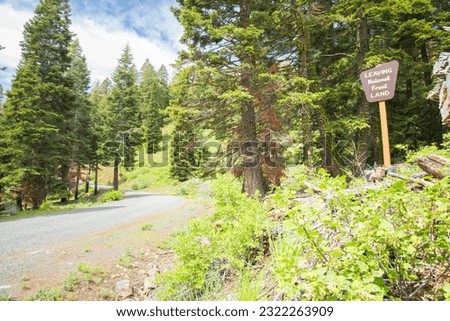 A sign in the Modoc National Forest warns travelers that they are leaving national forest land and entering private lands