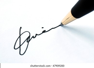 Sign The Name On A Paper With A Pen