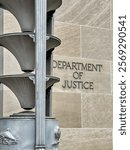 The sign next to the main door at the Department Of Justice in Washington DC.