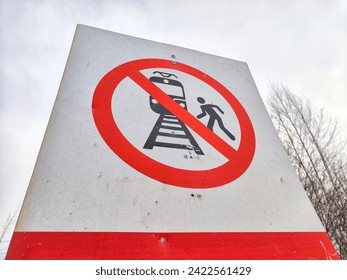 A sign not to walk on railway tracks. Railway Crossing Not Allowed or Walking on Railroad Prohibited. Russia - Powered by Shutterstock