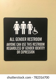 A Sign On A Bathroom Door In An Office Advises Workers Anyone, Regardless Of Gender Identity Can Use The Facility.  The Business Shows Respect To Transgender And Gender Neutral Workers