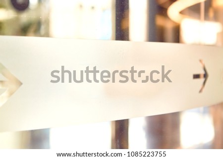 Sign on glass door to the business center