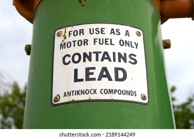 Sign on old fuel tank. For use as a motor fuel only. Contains lead. Antiknock compounds. Octane rating booster.