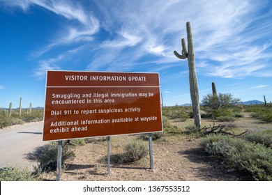 Sign At Organ Pipe National Monument, Near The US And Mexico Border, Warns Visitors To Be Aware Of Drug Cartels And Illegal Immigration In The Area