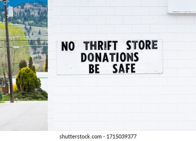 Sign Outside Thrift Store No Longer Accepting Donations Due To Covid-19 Pandemic