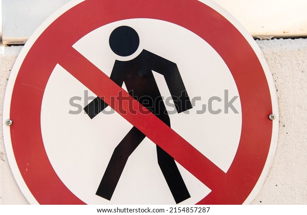 Sign Pedestrians\
not allowed with red\
circle