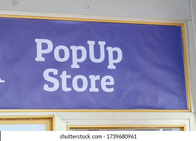 Sign Of A Pop Up Store White On Blue Background, 