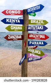 Sign Post With Multiple International Directions.