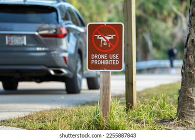 Sign prohibiting use of quadcopters in national park no drone area. Warning notice for using UAV