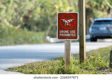 Sign prohibiting use of quadcopters in national park no drone area. Warning notice for using UAV - Shutterstock ID 2268397871