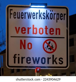 Sign for the prohibition of fireworks in German and English language. - Shutterstock ID 2243904629