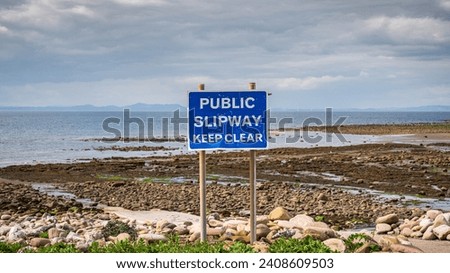 Sign: Public Slipway, Keep Clear - seen in Parton Beach, Cumbria, England, UK