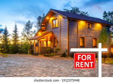 Sign for rent next to house. It symbolizes for rental apartment. for rent apartment in big country house. Country house is for long term rent. Concept is to renting cottage through real estate agent