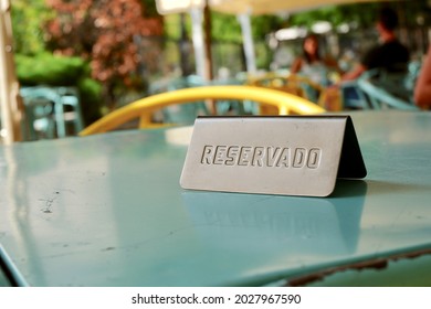 Sign Of Reserved Table On The Outside Terrace In Madrid, Spain. Concept Of Restaurant Business And Hospitality Sector Recovery After Covid19 Pandemic