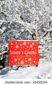 Sign To Santas Grotto In The Snow