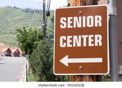 Sign For A Senior Center With An Arrow