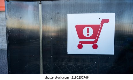 Sign Of Shopping Trolleys Parking Lot. Shopping Carts Return Point On A Parking Lot Near Supermarket. Shopping Cart Icon. Shopping Offline Concepts.