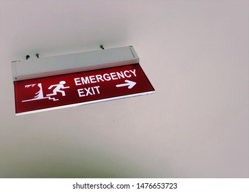 A sign showed the direction for emergency situation. Photo taken at malang east java indonesia, 12th august 2019. - Shutterstock ID 1476653723