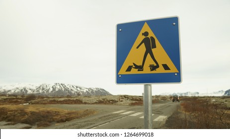 Sign Showing A Diver With Swimfin At Lake Þingvallavatn In Silfra, Iceland. 